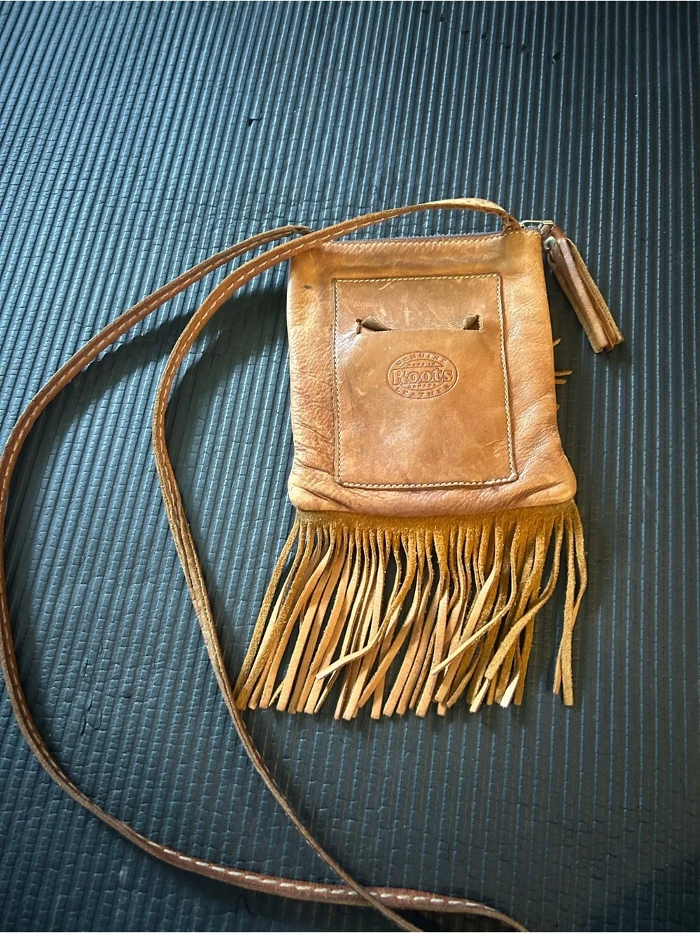 Roots, genuine leather, made in Canada Fringed Crossbody